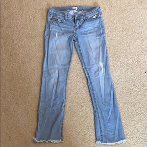 Light wash lightly ripped low rise jeans